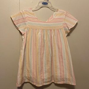Pastel striped blouse, long with ruffled sleeves.